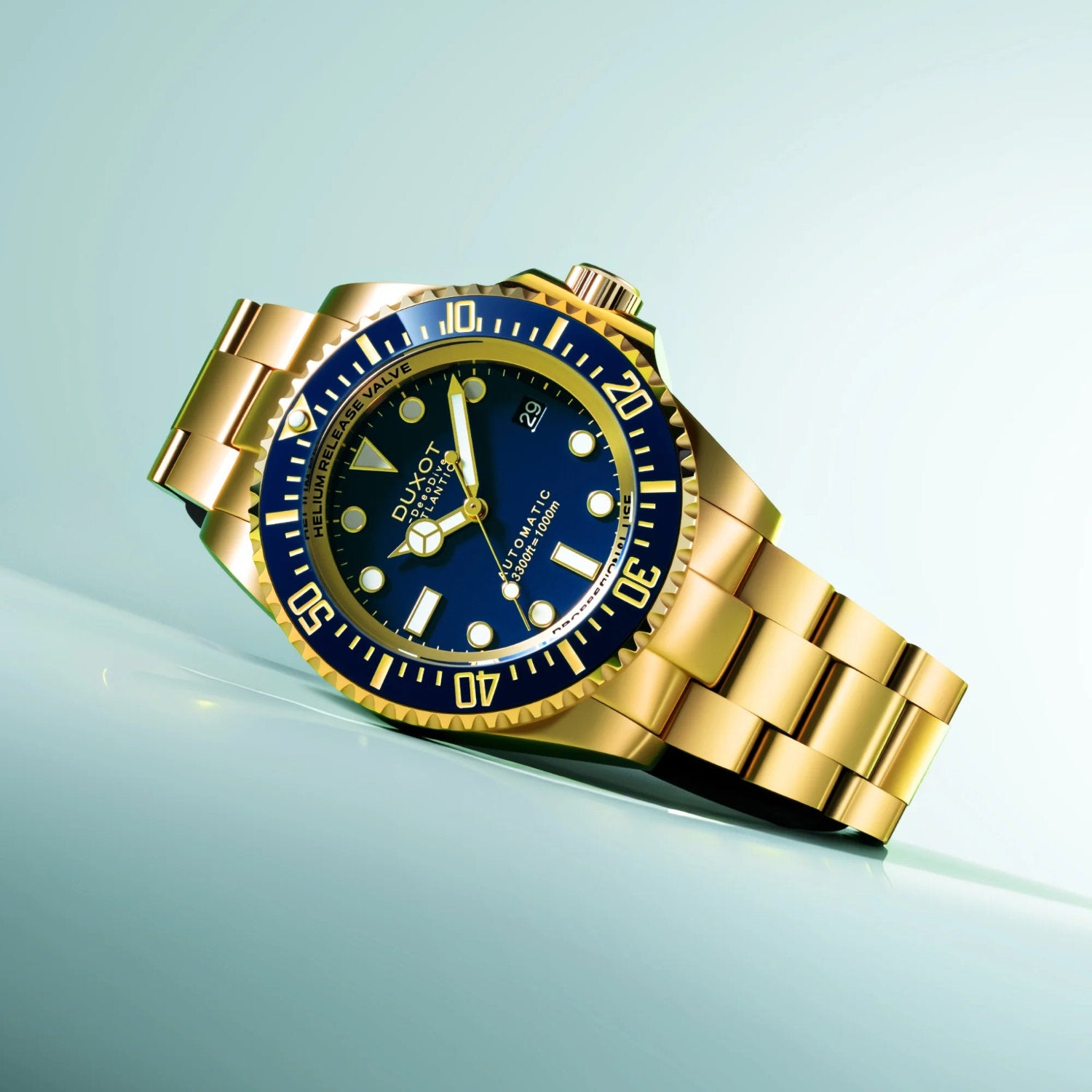 Automatikuhr ATLANTICA Deep Dive Automatic Limited Edition DX-2066-77 in Gold-Optik mit blauen Ziffern auf hellem Hintergrund.