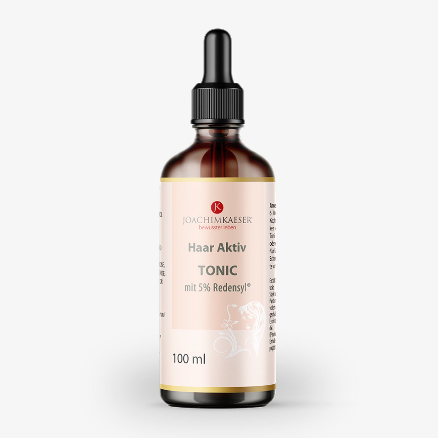 Braune Flasche mit Pipette, Etikett "Joachim Kaeser Haar Aktiv Tonic mit 5% Redensyl", Inhalt 100 ml.