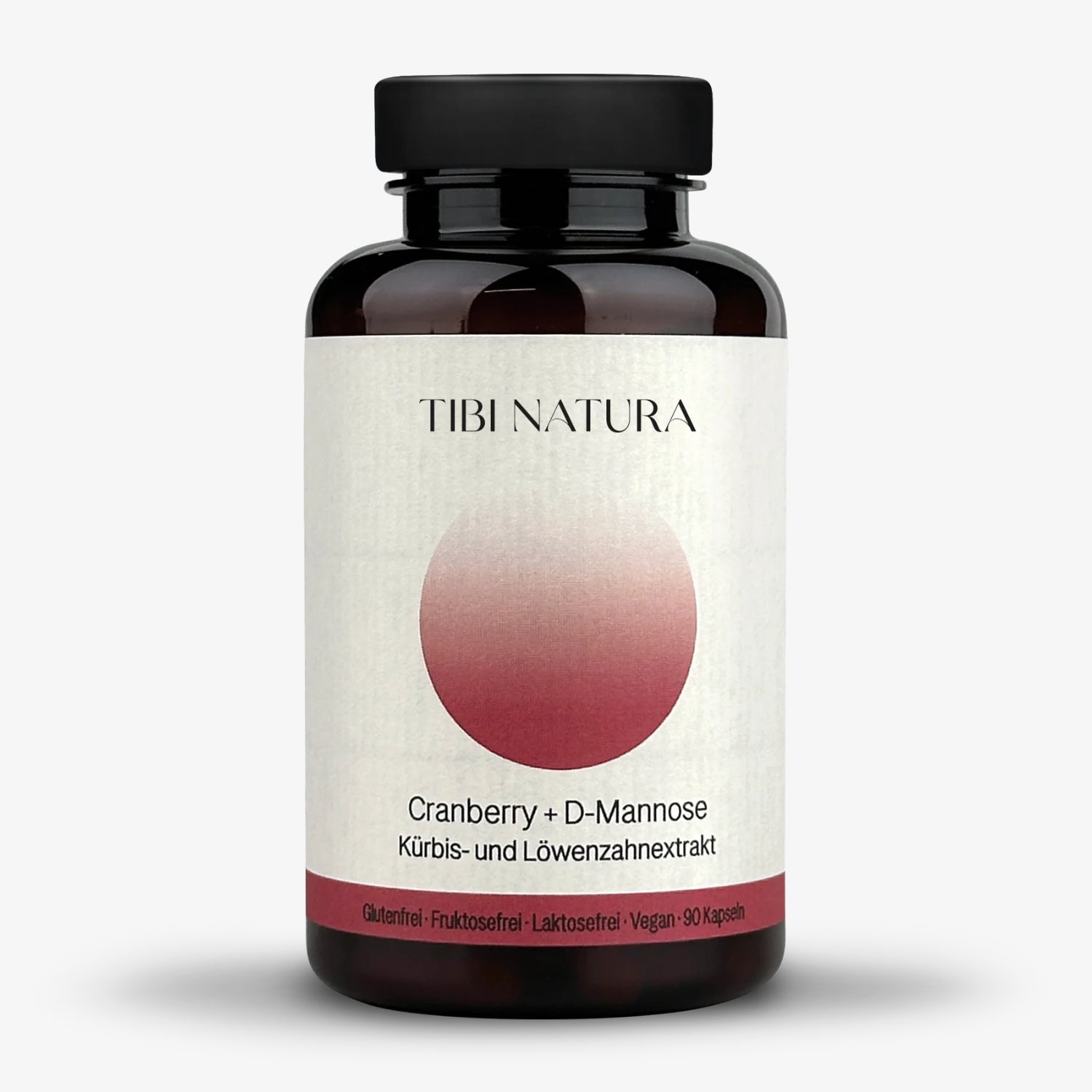 Dunkle Flasche von Tibi Natura mit Etikett "Cranberry + D-Mannose, Kürbis- und Löwenzahnextrakt, 90 Kapseln".