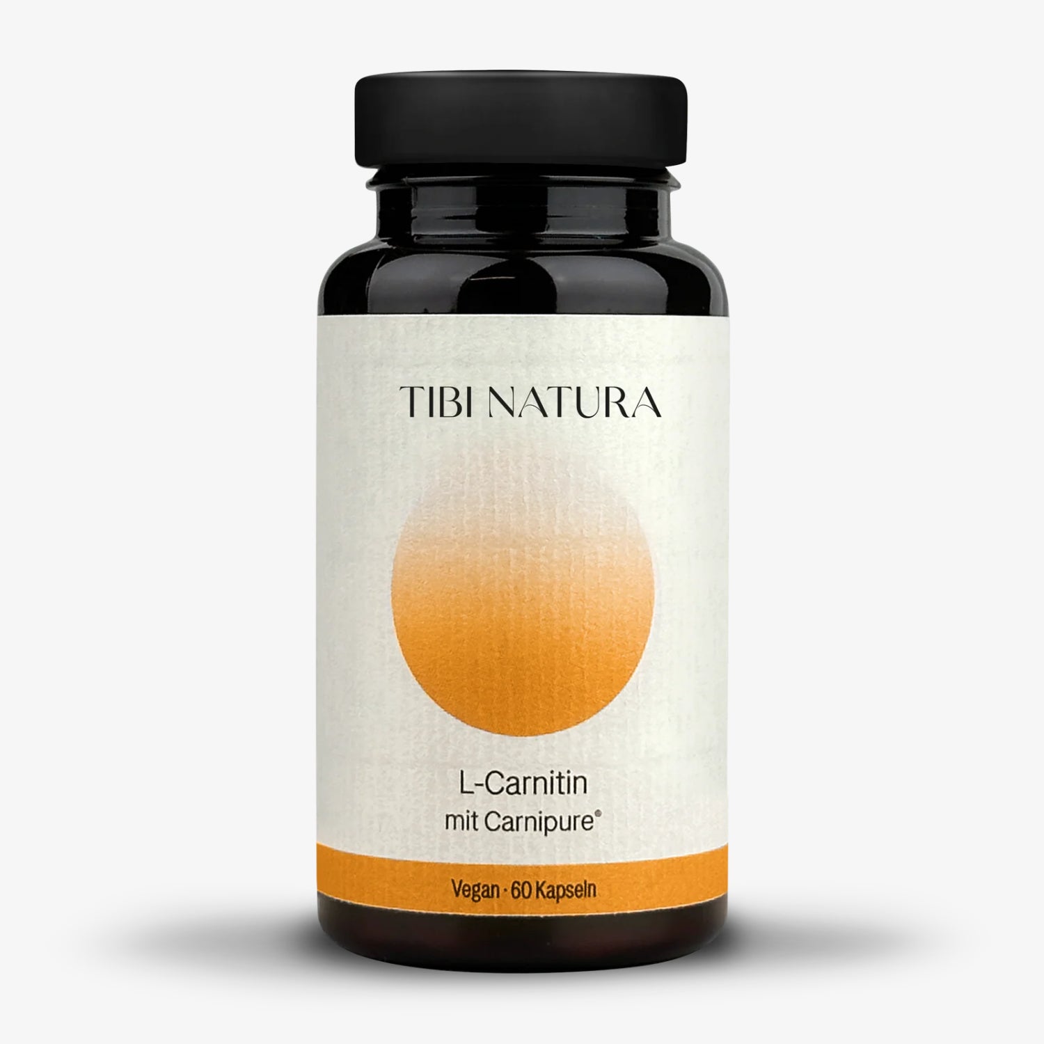 Schwarze Flasche mit dem Etikett "Tibi Natura L-Carnitin mit Carnipure, Vegan, 60 Kapseln" auf weißem Hintergrund.