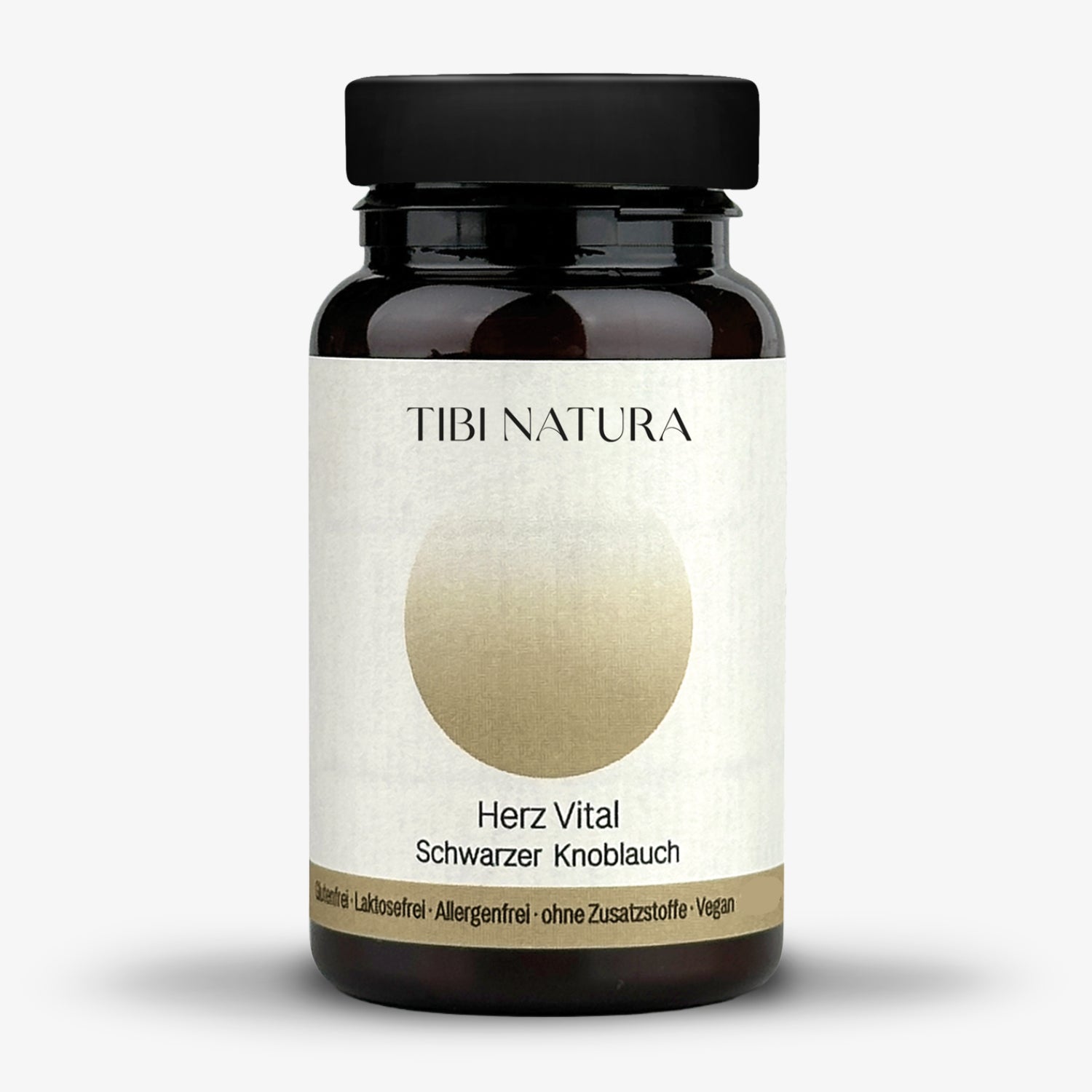 Braunes Glasgefäß mit schwarzem Deckel, beschriftet mit "TIBI NATURA Herz Vital Schwarzer Knoblauch", glutenfrei, vegan.