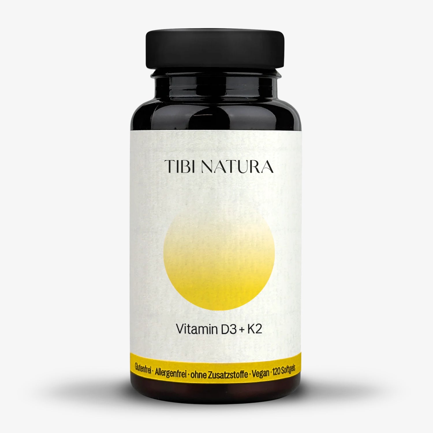 Schwarze Flasche mit weißem Etikett, Aufschrift "Tibi Natura", Vitamin D3 + K2, vegan, 120 Softgels.