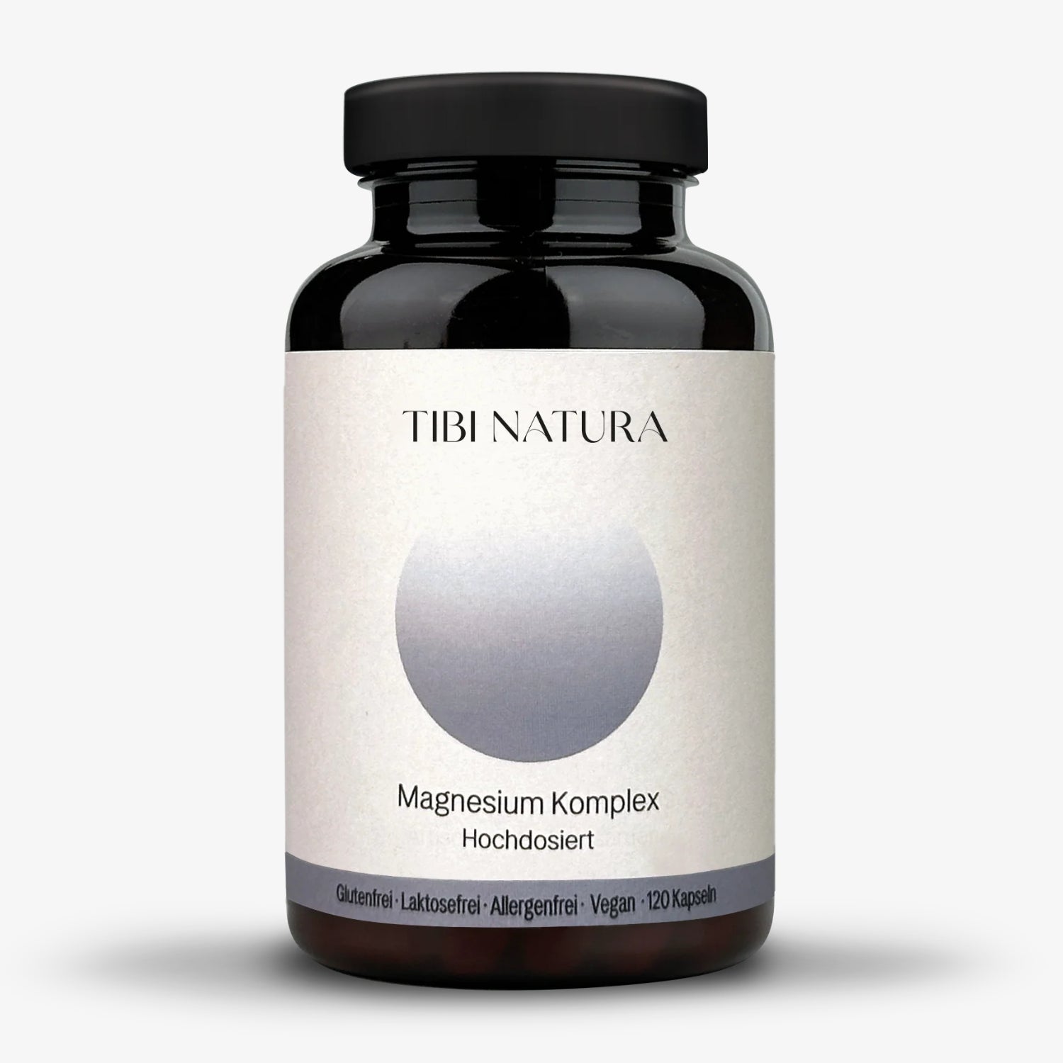 Schwarze Pillenflasche mit dem Etikett "Tibi Natura Magnesium Komplex Hochdosiert". Enthält 120 vegane Kapseln.