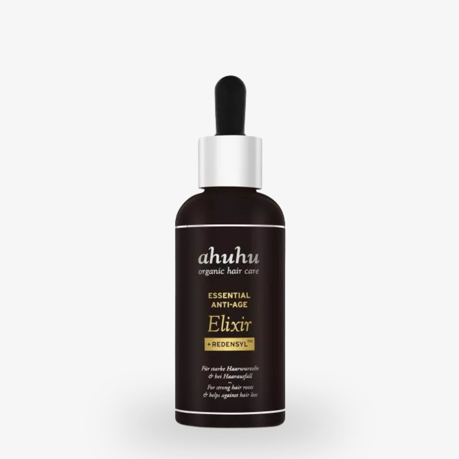 Dunkle Flasche mit Pipette und der Aufschrift "ahuhu organic hair care Essential Anti-Age Elixir + Redensyl".
