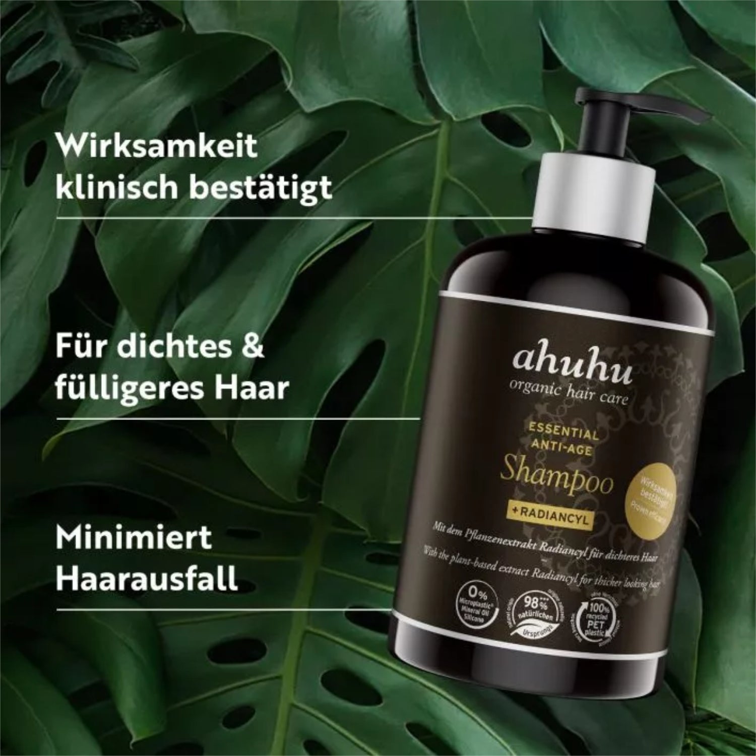 Eine Shampoo-Flasche von Ahuhu auf einem Hintergrund aus grünen Blättern, mit Texten zur Wirksamkeit und Haarstärkung.