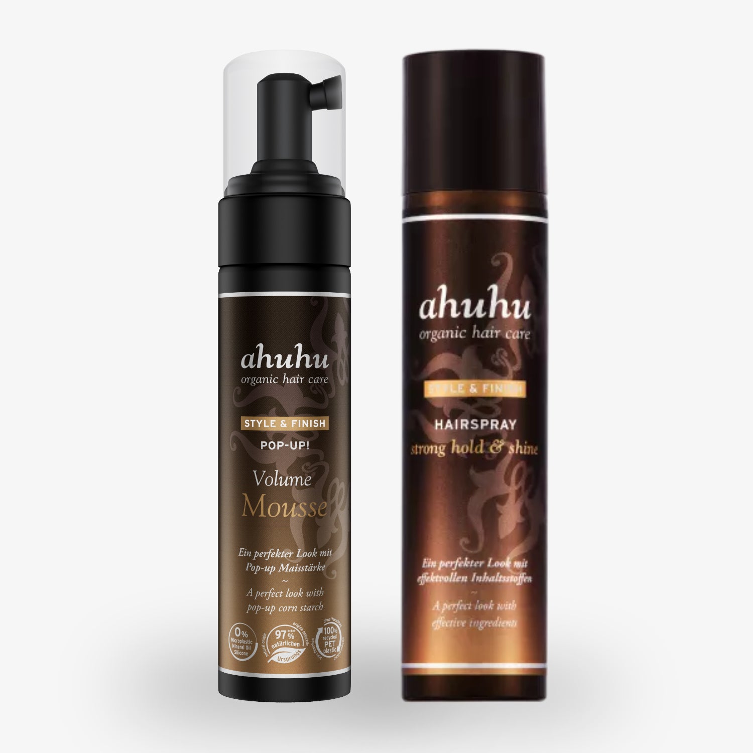 Zwei Haarpflegeprodukte von ahuhu: Volumenmousse und Haarspray in braunen Flaschen mit weißen Schriftzügen.