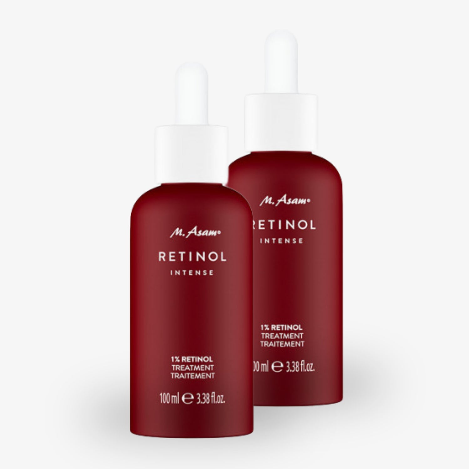 Zwei rote Flaschen mit Pipettenaufsatz, beschriftet mit "M. Asam Retinol Intense, 1% Retinol Treatment, 100 ml".