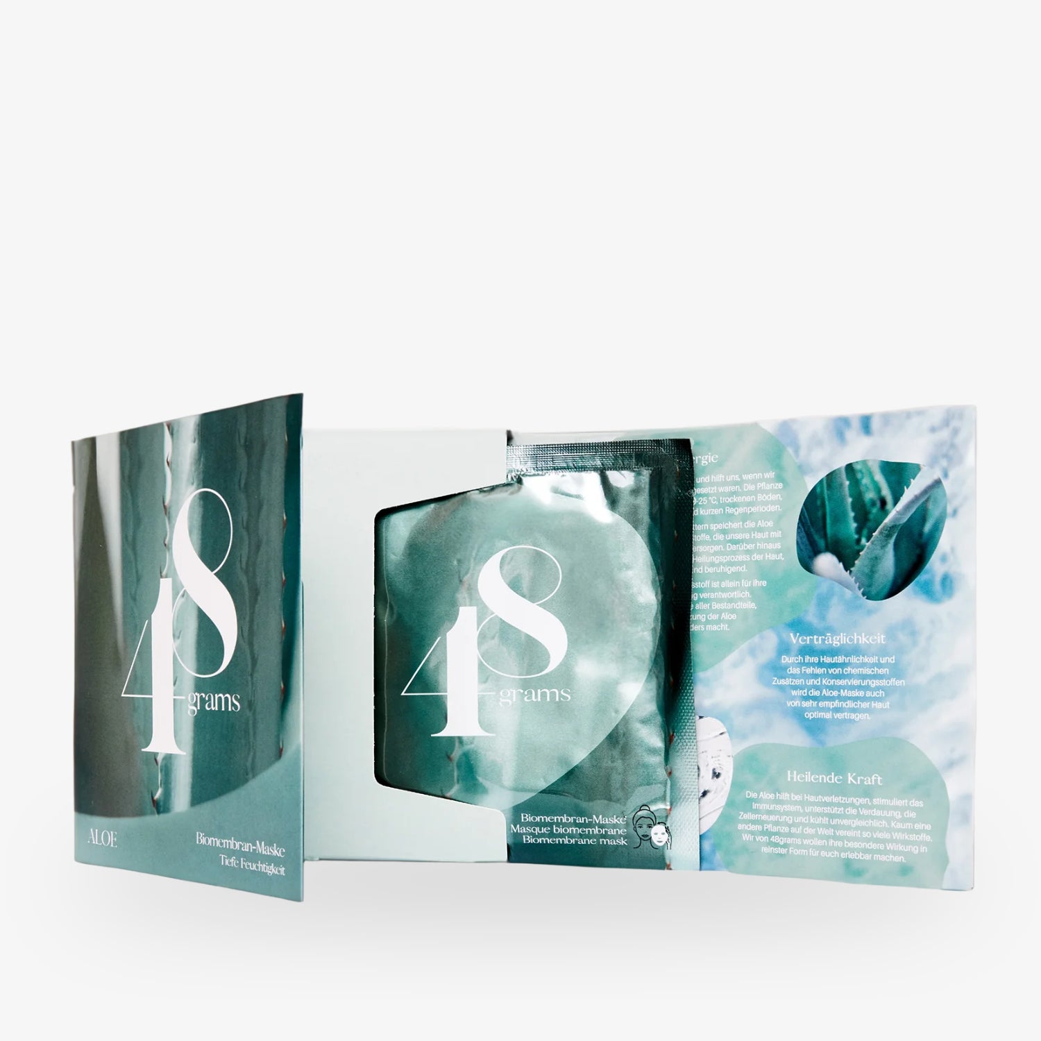 Geöffnete Verpackung einer Gesichtspflege-Maske namens "48 grams" mit Aloe-Inhaltsstoffen und Beschreibungstexten.