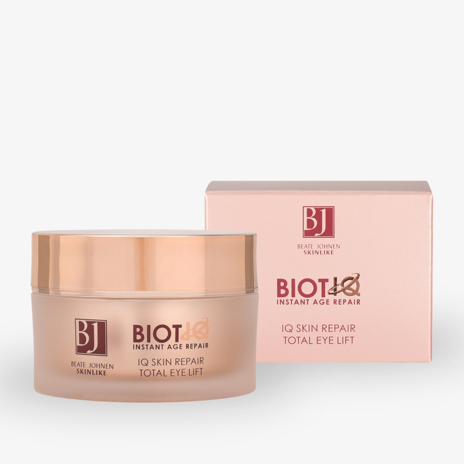 Ein rosa Cremetiegel mit der Aufschrift „BIOTIQ IQ Skin Repair Total Eye Lift“ neben der passenden Verpackung.
