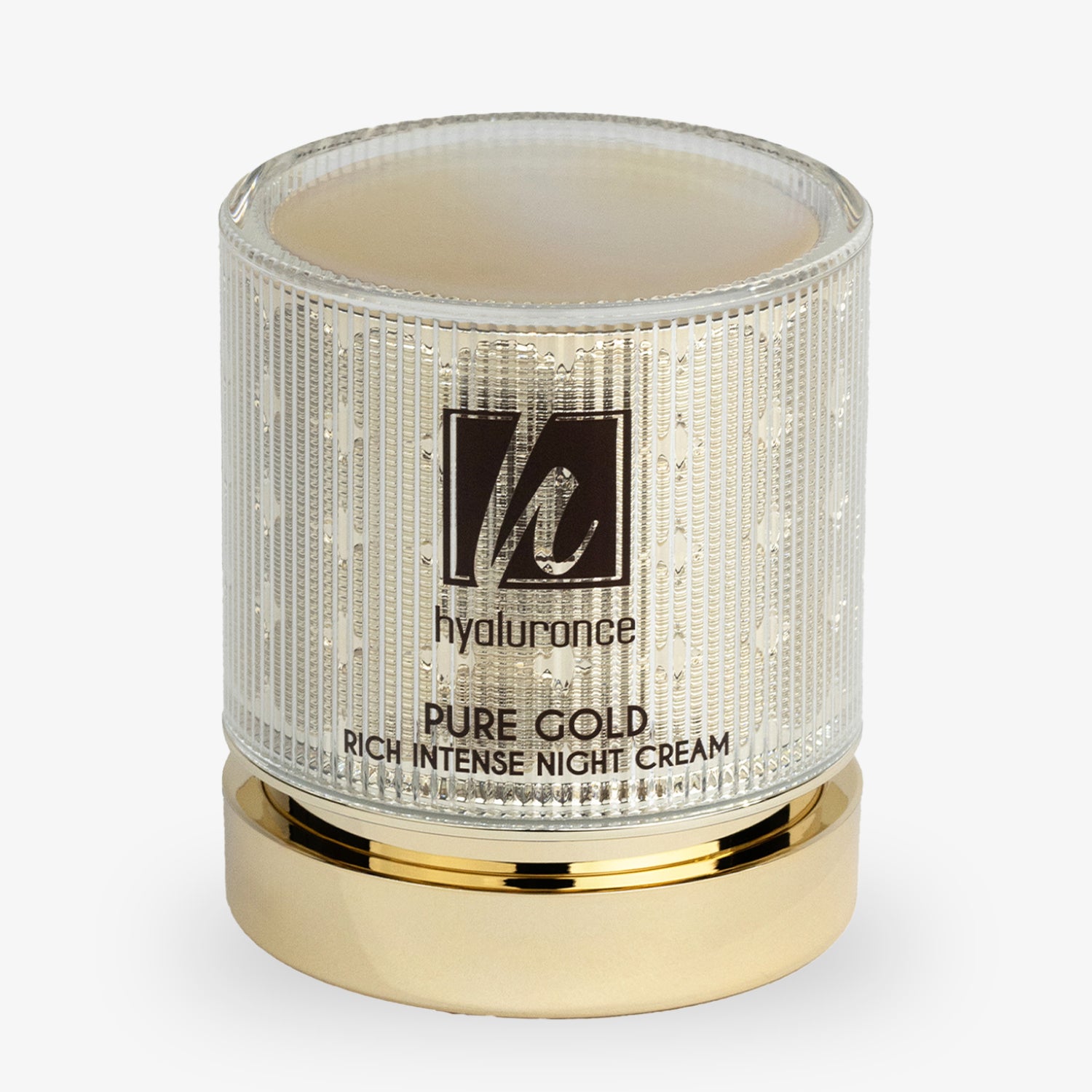 Transparenter Tiegel mit goldener Basis, enthält eine Nachtcreme mit der Aufschrift "Pure Gold Rich Intense Night Cream".