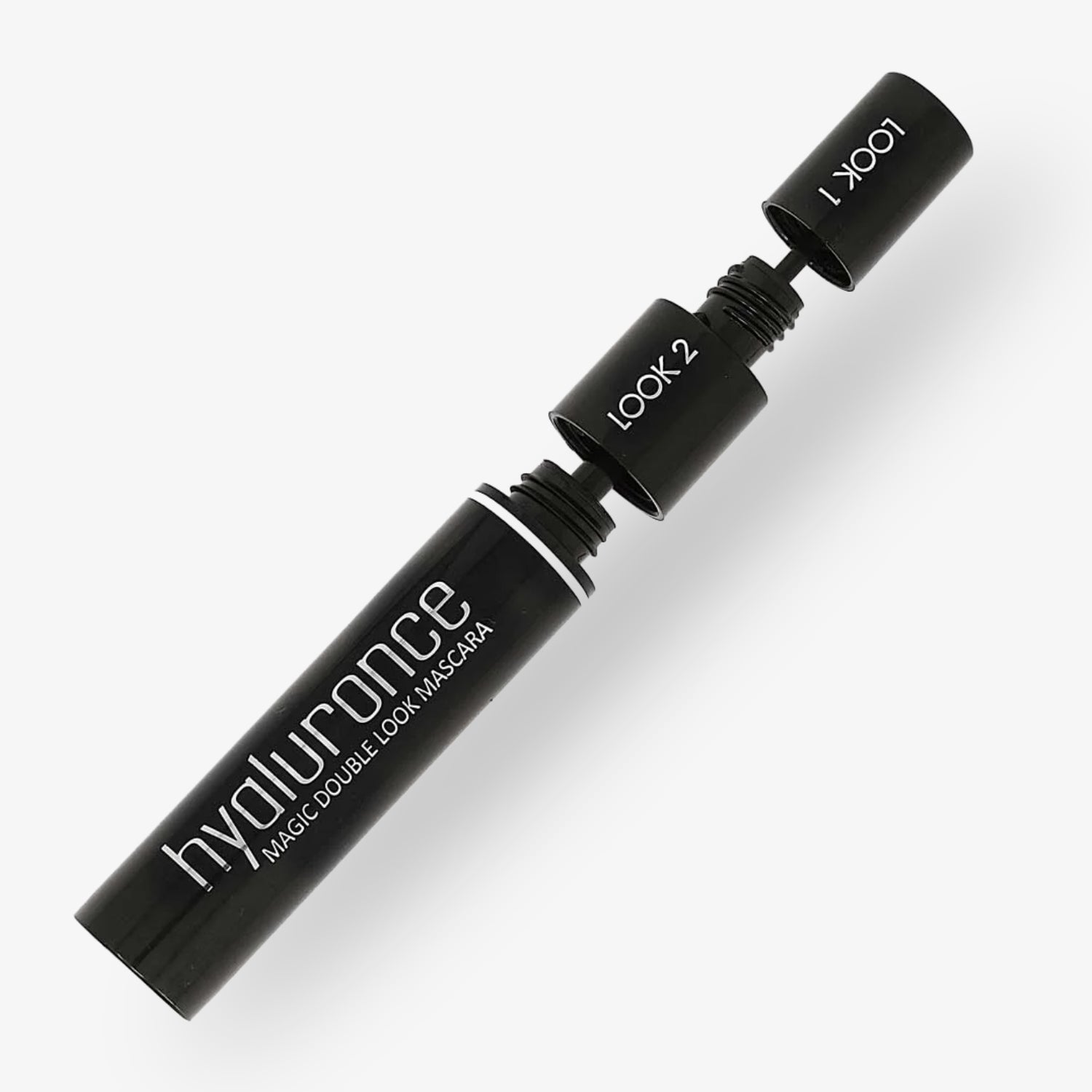 Schwarze Mascara mit zwei Bürstenaufsätzen, beschriftet mit "Look 1" und "Look 2", auf weißem Hintergrund.
