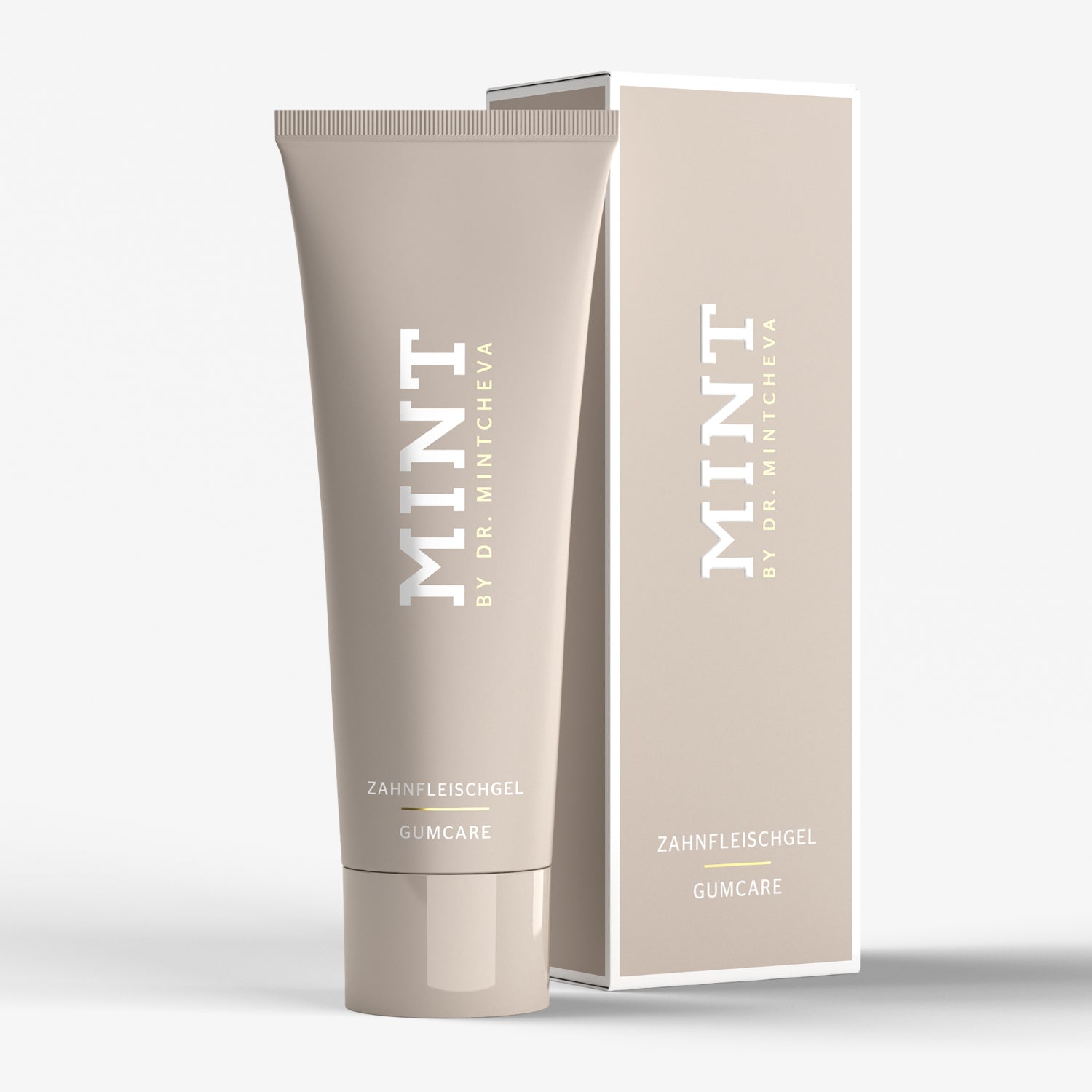 Beige Tube und Verpackung mit der Aufschrift "MINT BY DR. MINTCHEVA - ZAHNFLEISCHGEL GUMCARE".