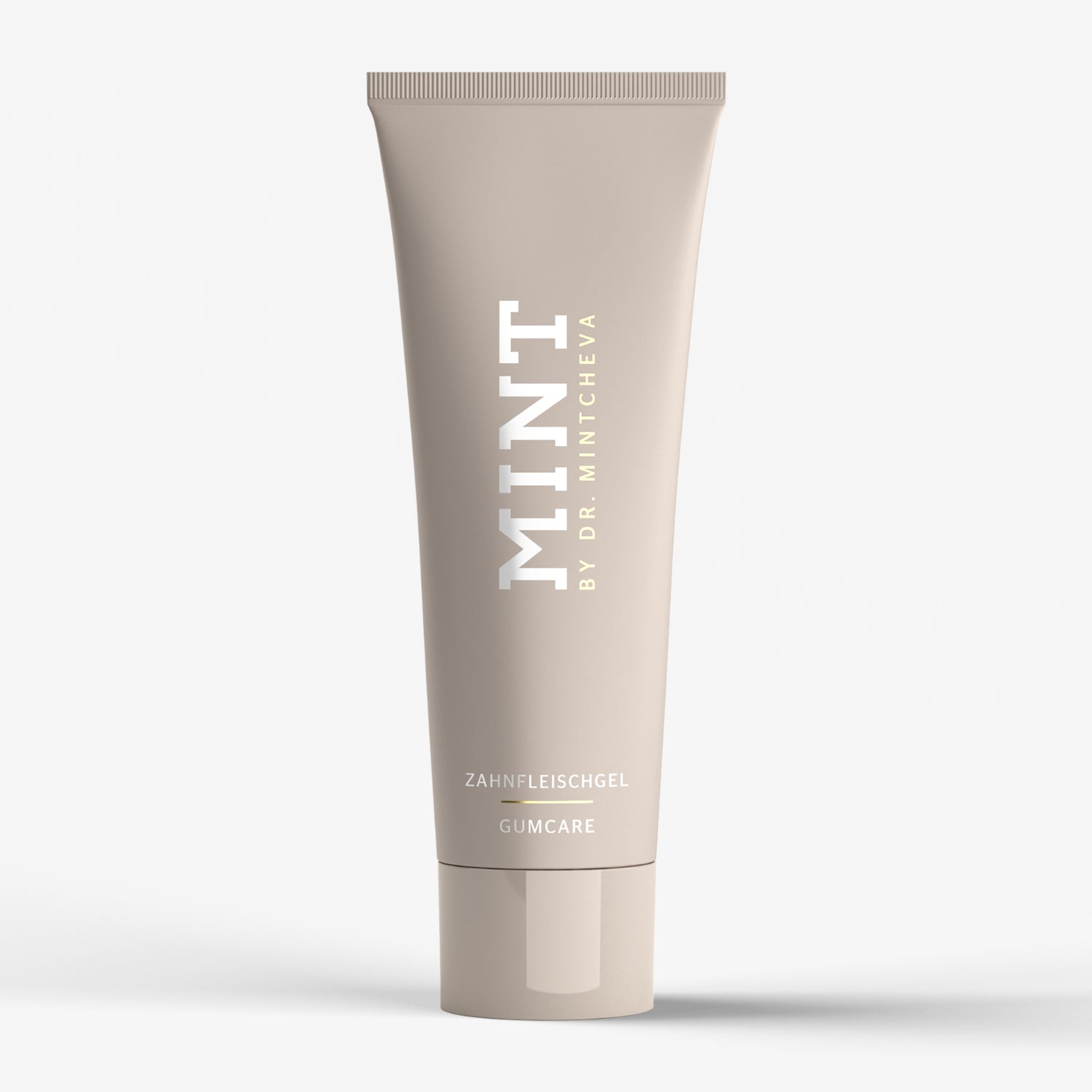 Beige Tube mit der Aufschrift "MINT by Dr. Mintcheva", enthält Zahnfleischgel zur Pflege des Zahnfleisches.