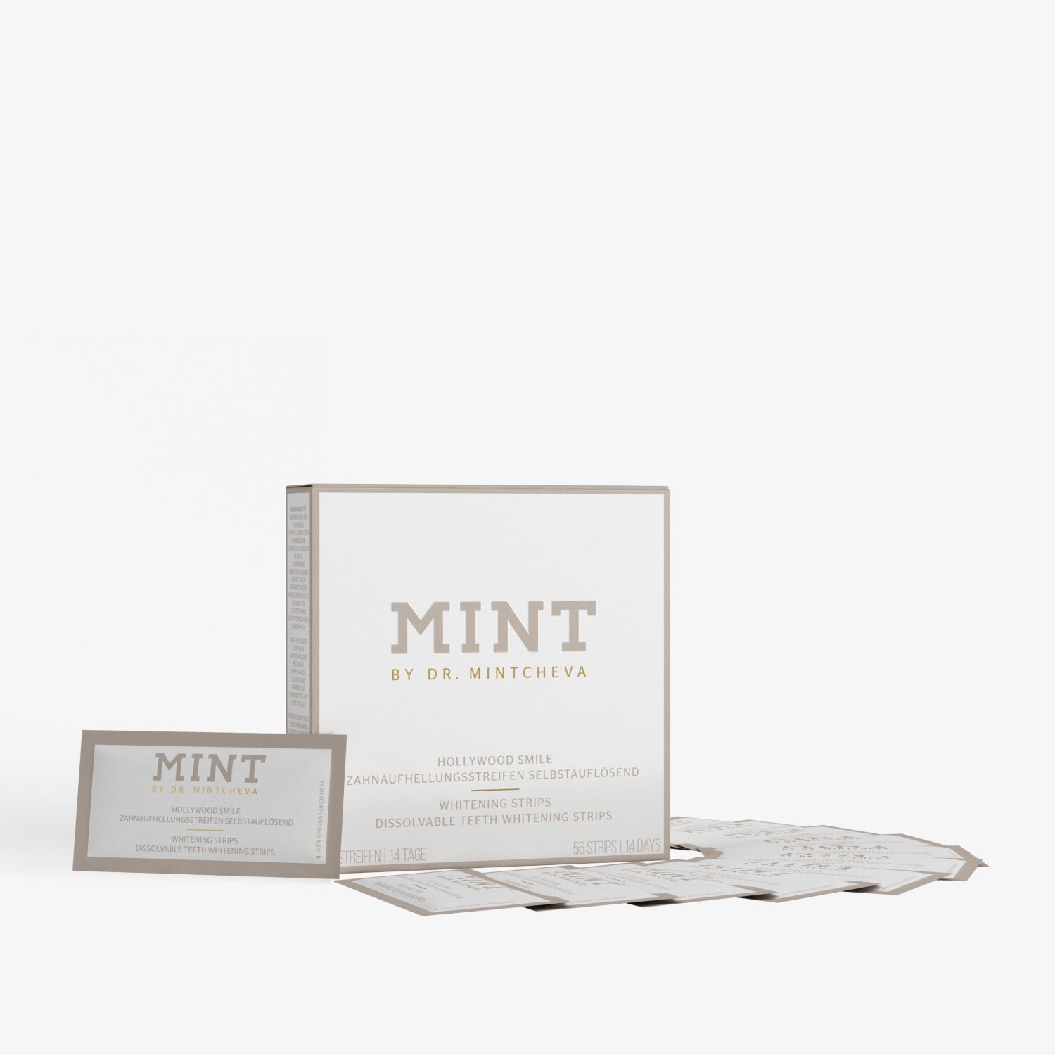 Verpackung von Mint Zahnaufhellungsstreifen, mit einigen herausliegenden Streifen auf einem weißen Hintergrund.