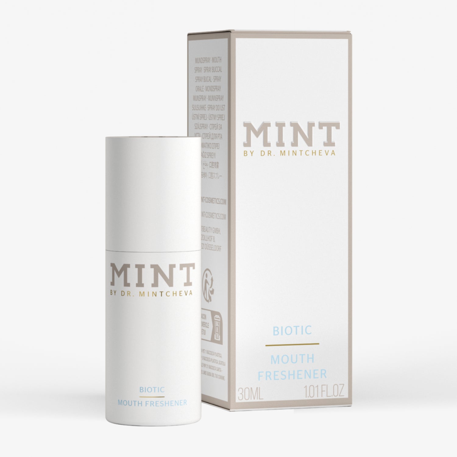Eine weiße Flasche "Mint Biotic Mouth Freshener" steht neben ihrer Verpackung.