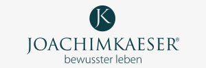 Logo mit der Aufschrift "JOACHIMKAESER® bewusster leben" und einem Kreis mit den Buchstaben "J" und "K" darin.