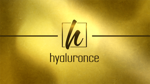 Ein unscharfes Bild mit einem kleinen grauen Quadrat auf einem weißen Hintergrund in der Mitte.