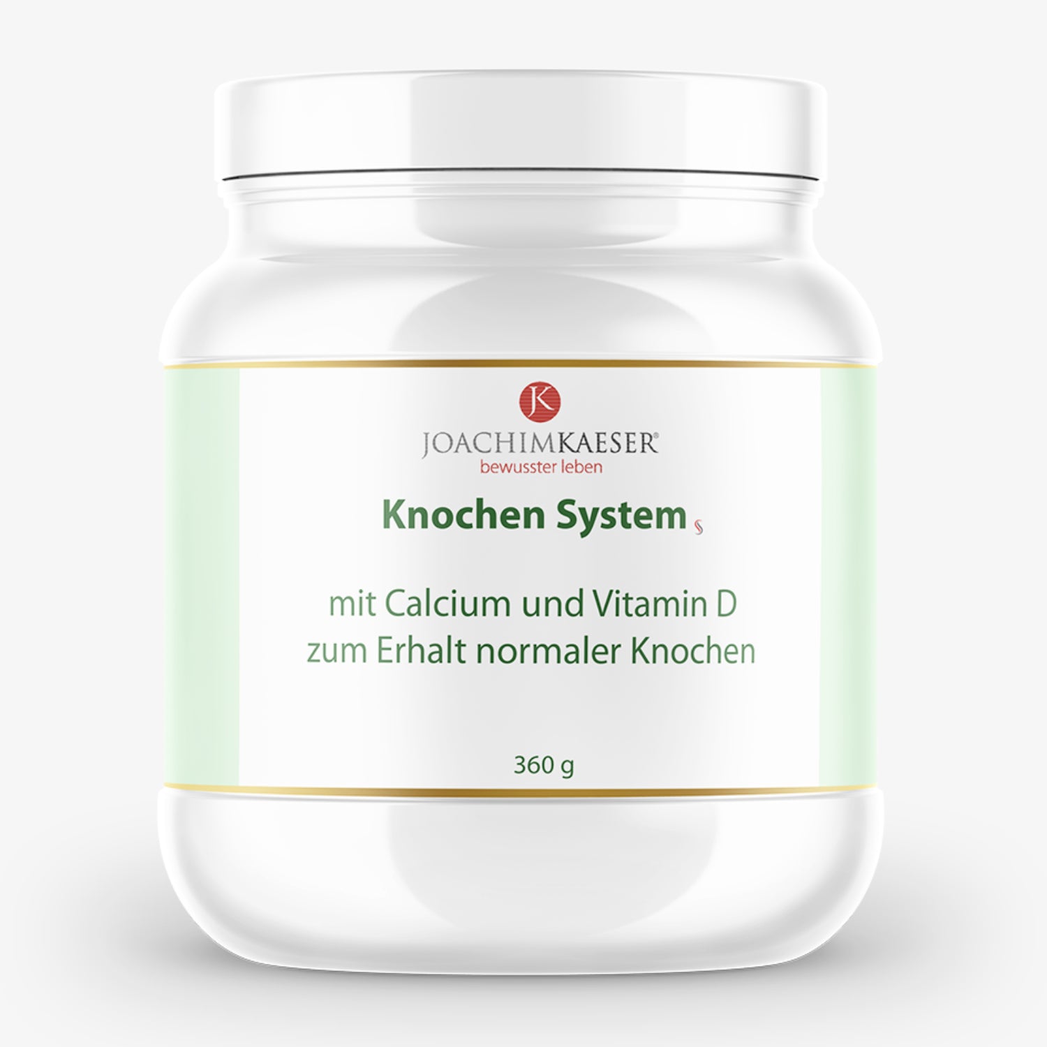 Ein weißer Behälter von Joachim Kaeser, beschriftet mit "Knochen System" und Informationen zu Calcium und Vitamin D.