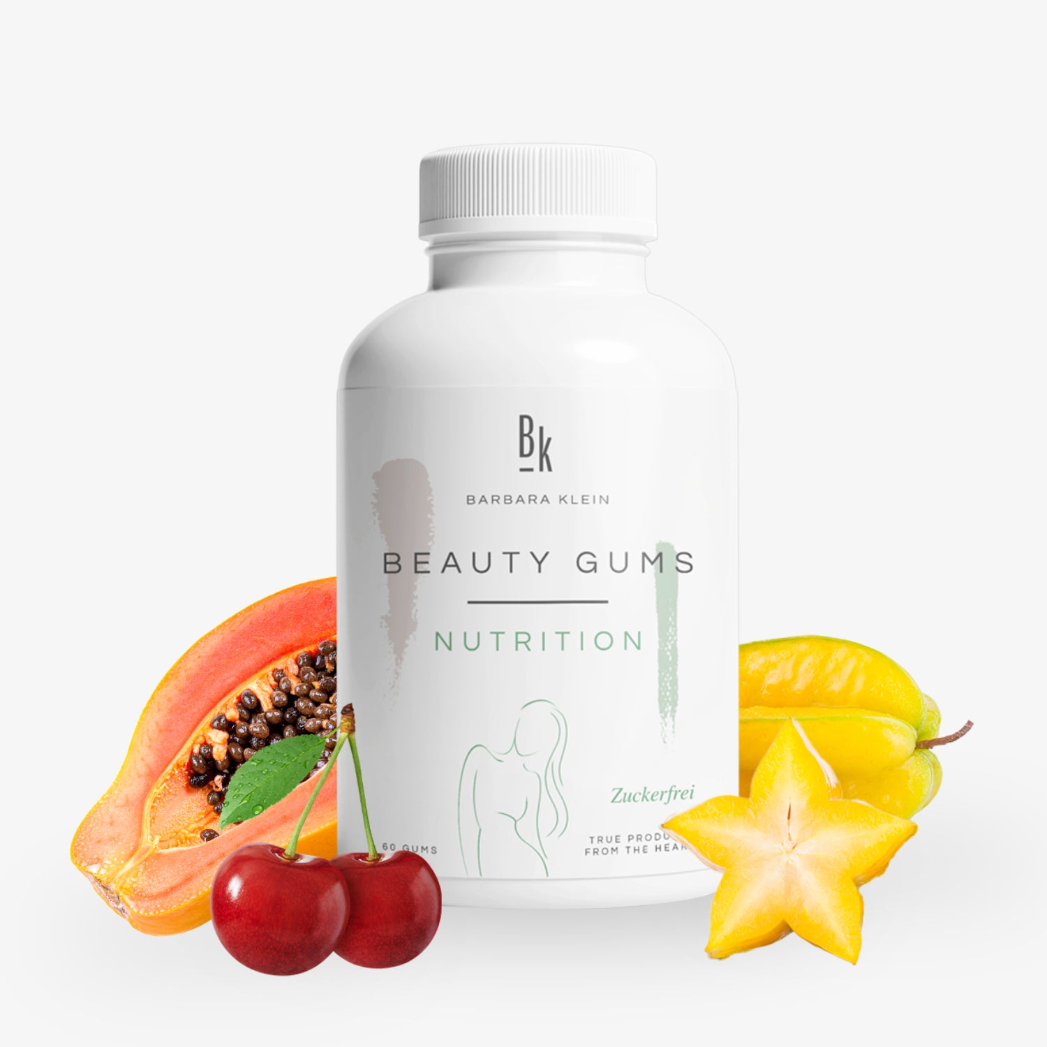 Weiße Flasche mit der Aufschrift "Beauty Gums Nutrition", umgeben von Papaya, Kirschen und Sternfrucht.
