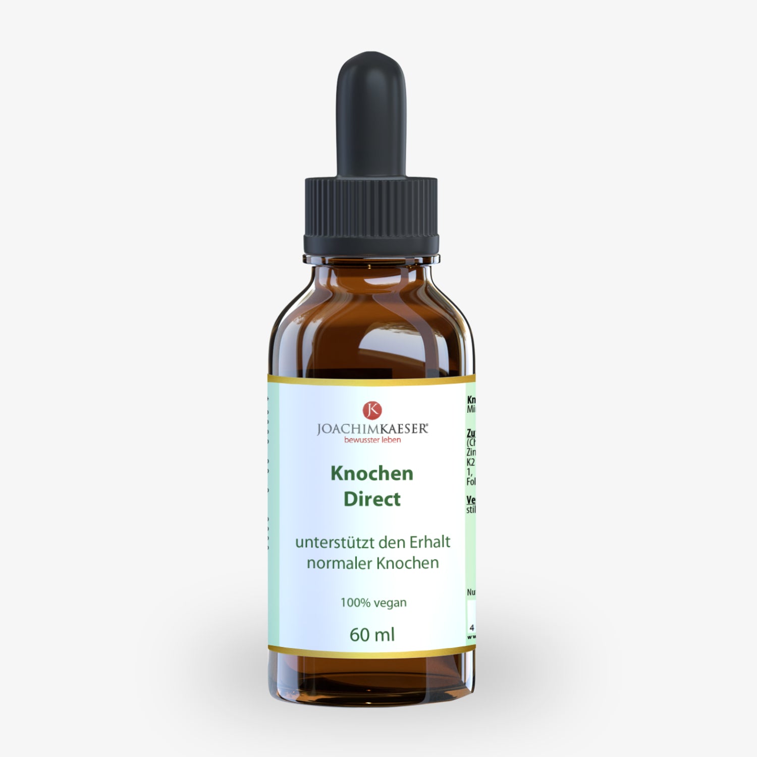 Braune Glasflasche mit schwarzer Pipette, Etikett "Knochen Direct" von Joachim Kaeser, 60 ml, 100% vegan.