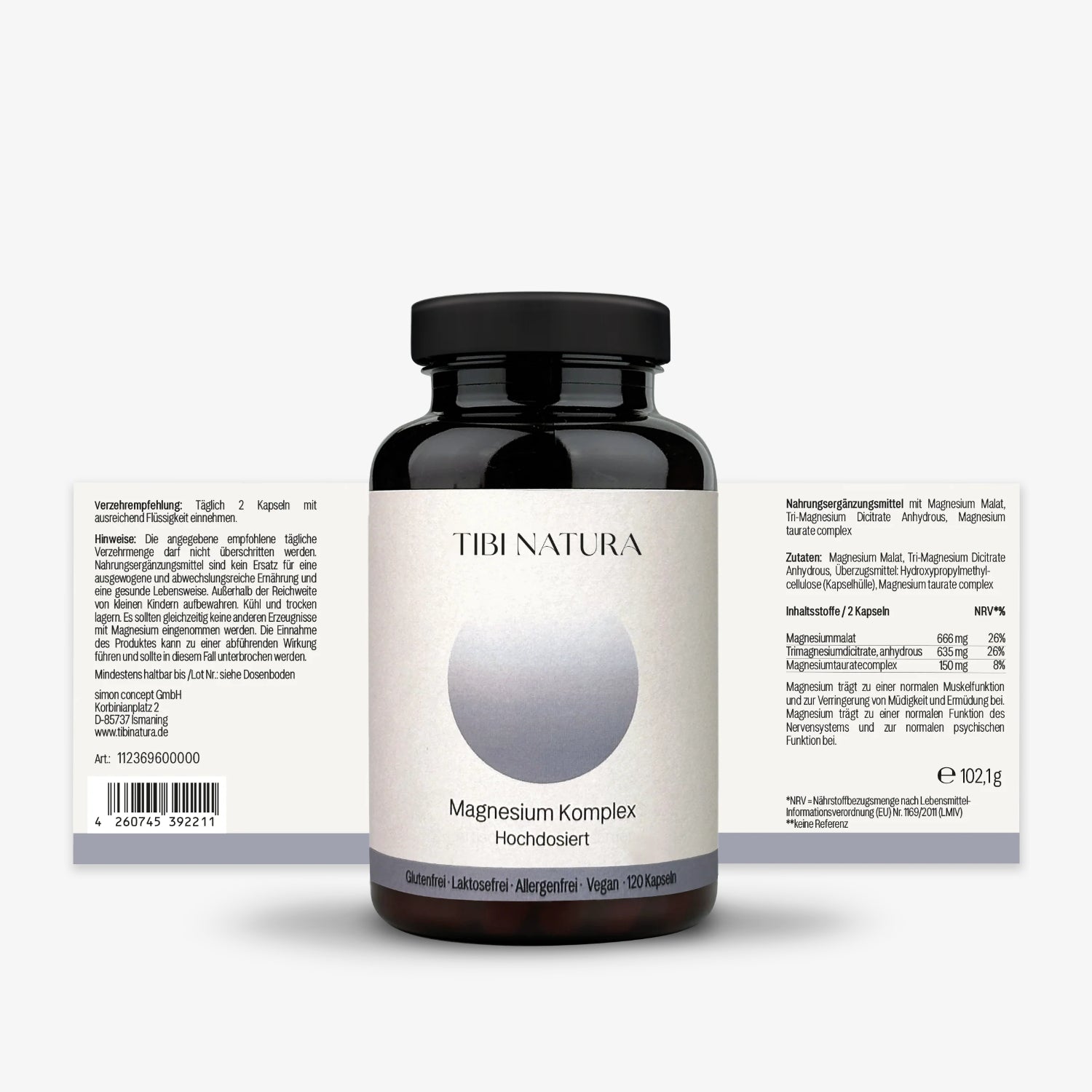 Schwarzes Fläschchen "Tibi Natura Magnesium Komplex" vor Produktverpackung mit Zutaten und Anleitung in Deutsch.