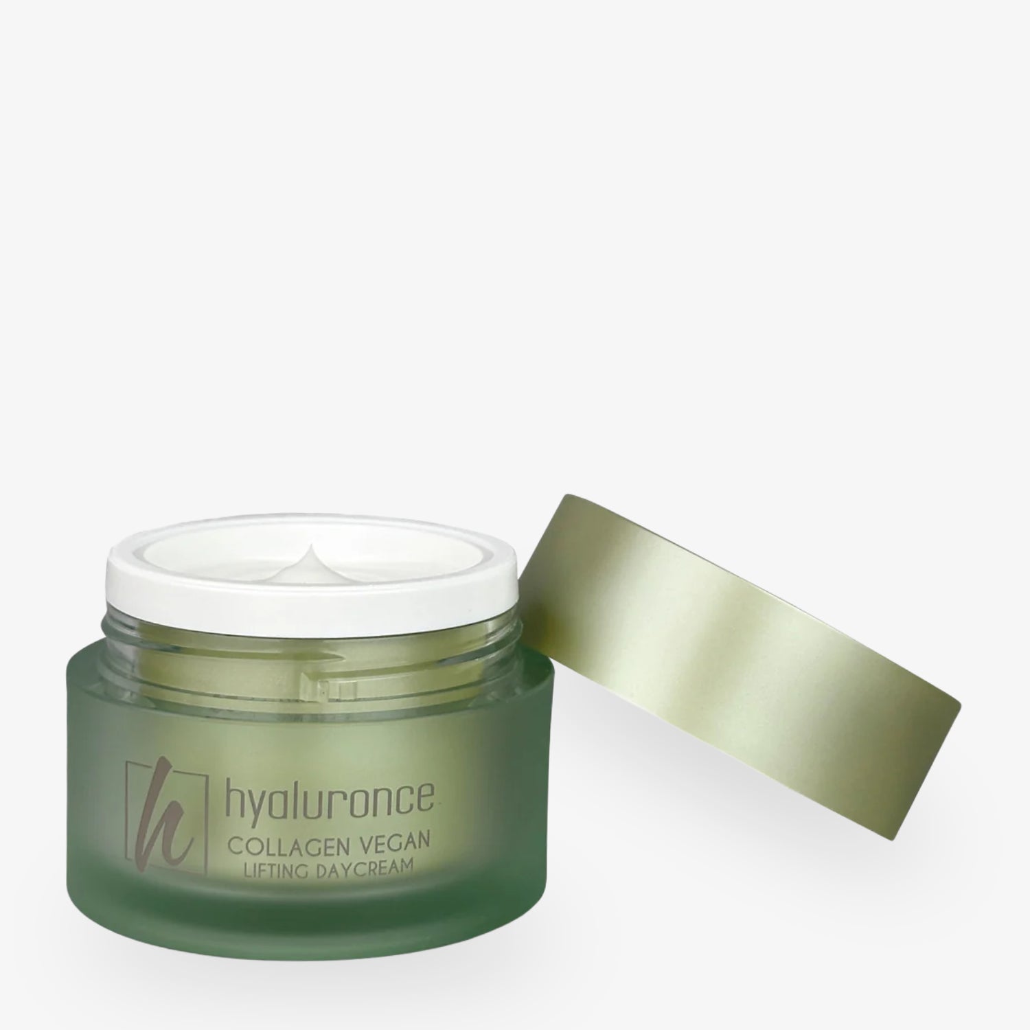 Collagen Vegan Lifting Tagescreme in einem Glasbehälter mit grünem Deckel und offener Verpackung