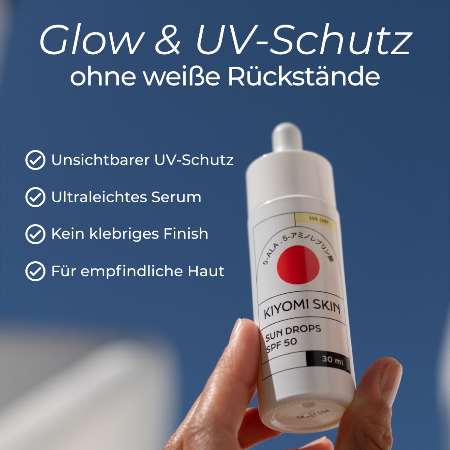 Sonnenserum Sun Drops SPF 50 in einer weißen Flasche, bietet leichten UV-Schutz ohne Rückstände, für empfindliche Haut.