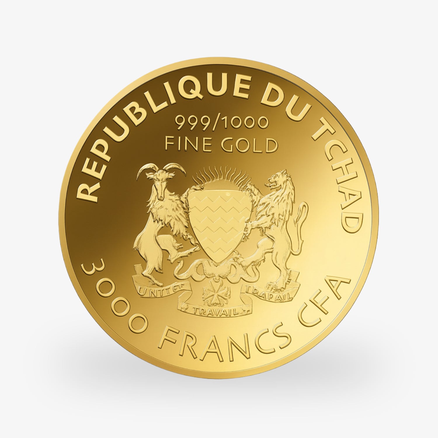 Goldmünze mit Inschrift "REPUBLIQUE DU TCHAD", "999/1000 FINE GOLD" und "3000 FRANCS CFA", zeigt Ziegen- und Löwenwappen.