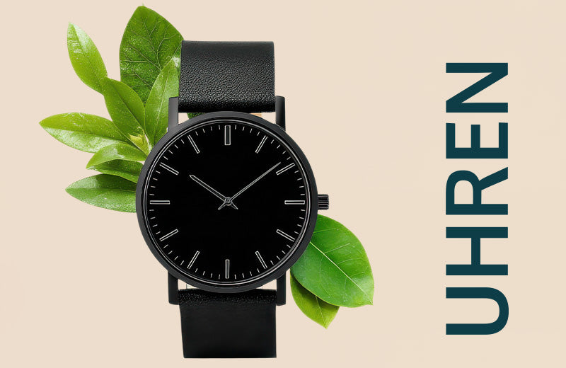 Schwarze Armbanduhr mit Blättern im Hintergrund und dem Wort "UHREN" daneben.